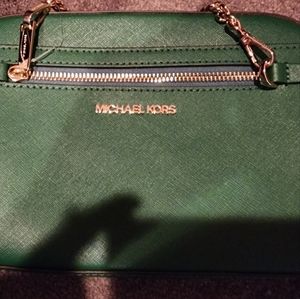 Michael Kors green handbag with matching change purae
